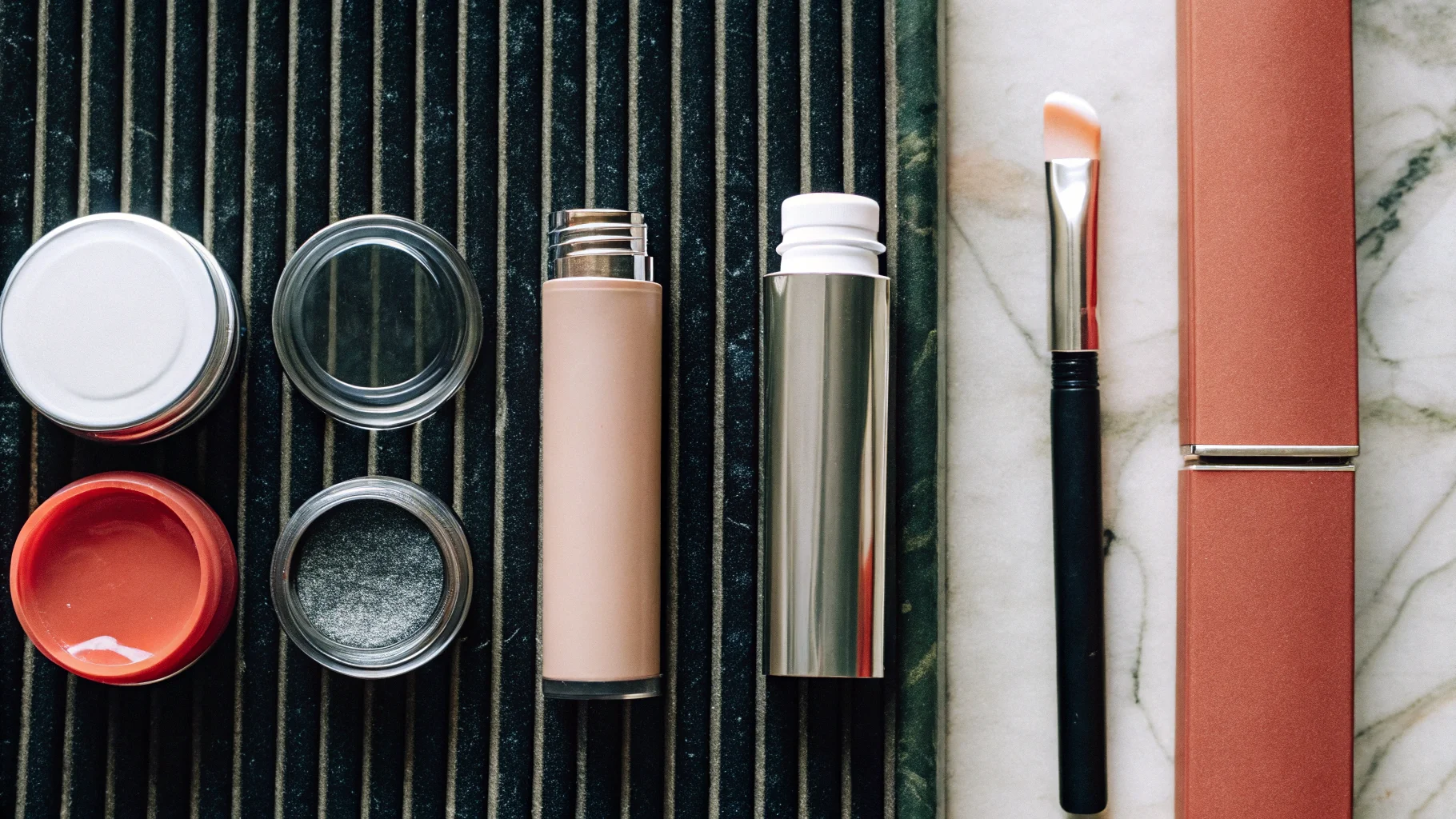 A flat lay of cosmetic products in different sustainable materials like glass, aluminum, and paper